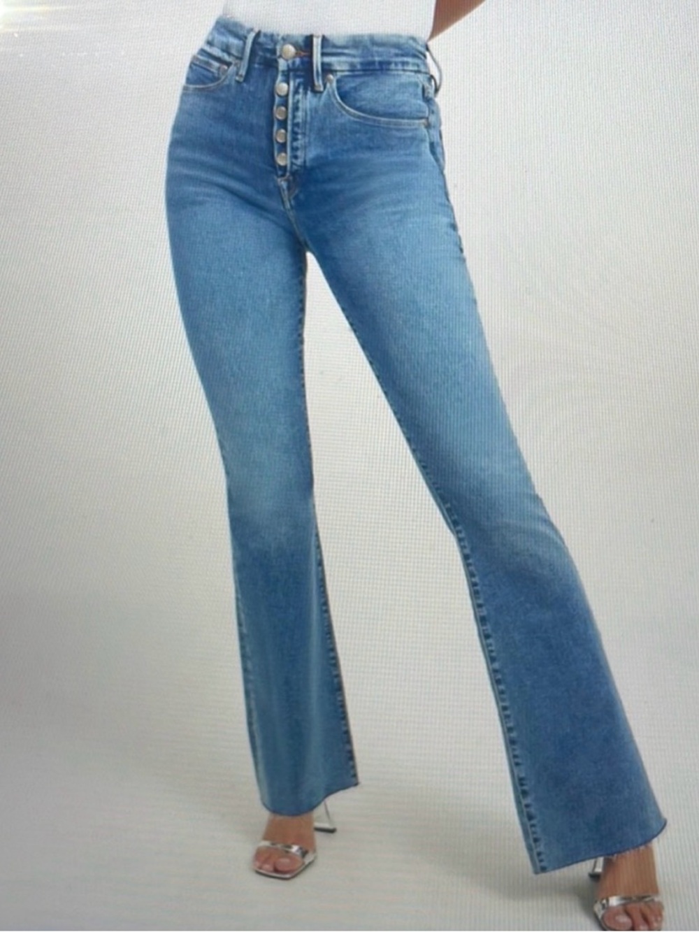 Good American Light Blue Flare Jeans with Raw Hem